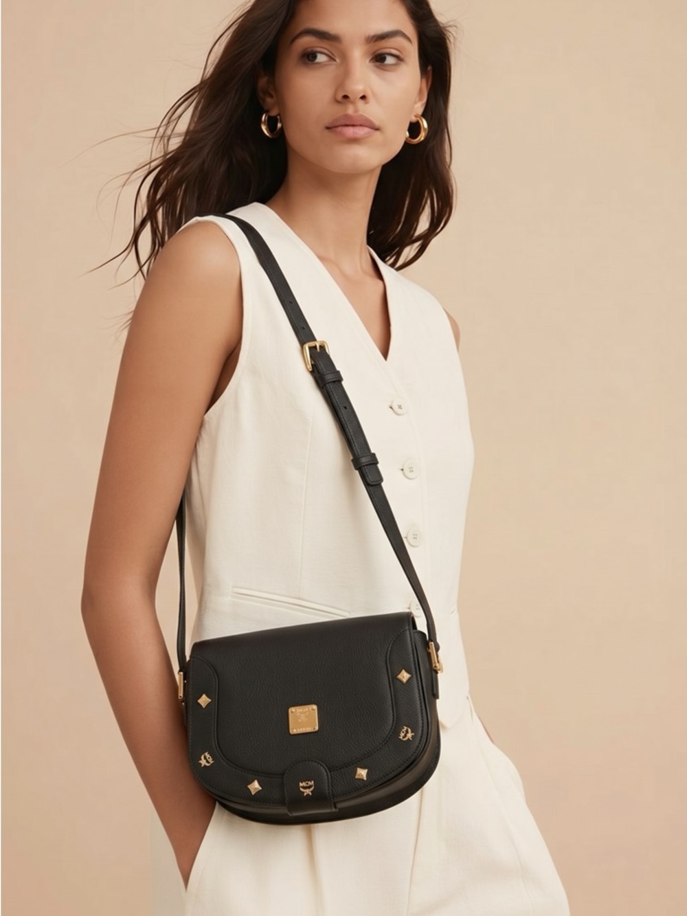 MCM Black Crossbody Bag with Gold Accents